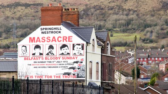 Mural of Springhill westrock massacre on Springfield Road in Belfast, Northern Ireland 09022014 CREDIT Alamy Stock Photo