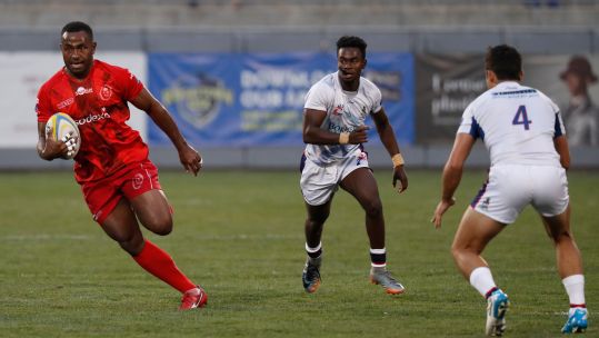 Joseva Nayacavou playing against the Cayman Islands for the Army Sevens in 2018