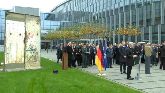 A ceremony was held around the Berlin Wall Memorial, outside NATO headquarters (Picture: NATO TV).