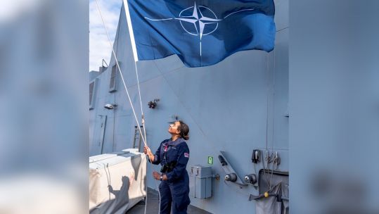 NATO's flag flying on HMS Diamond after the ship joined up with NATO partners and allies in the Mediterranean