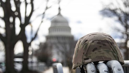 Cover image: National Guard helmet in the grounds of the Capitol (Picture: USA Today Network/SIPA USA/PA).