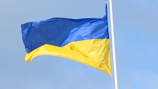 National Ukrainian flag on a blue sky background