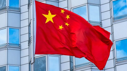 National flag of the People's Republic of China in front of the Chinese embassy in Berlin (Picture: PA).