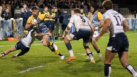 Navy players try to stop the Australian from scoring in Plymouth Credit Alligin Photography Date 16092022.jpg