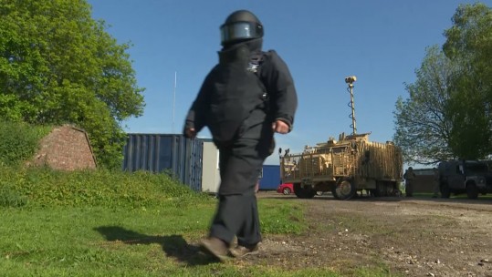 Explosive Ordnance Disposal operator in Blast Suit