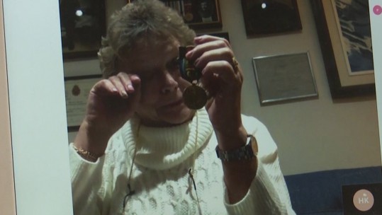 Peg Johnson receives Joseph Hewson's WW1 medal