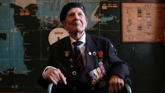 Normandy veteran George Chandler, 99, posing for a photograph in the Map room at Southwick House