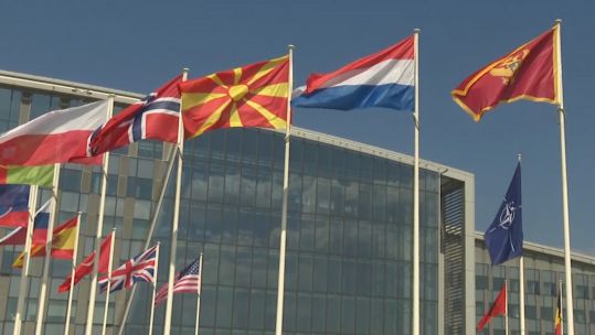 North Macedonian flag alongside other alliance flags outside (Picture: NATO TV).