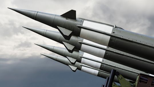 Nuclear Missiles With Warhead Aimed at Gloomy Sky Balistic Rockets War Background