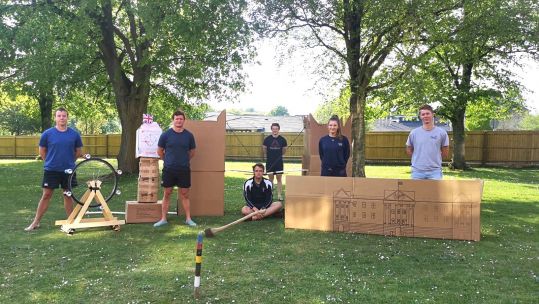 The Officers of the Household Cavalry pose with the mock iconic London landmarks. Credit: Officers' Mess HCR