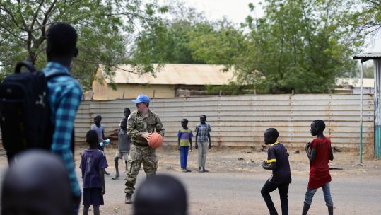 Op Trenton soldier with children in South Sudan 150719 CREDIT BFBS UN.jpg 