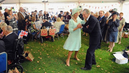 Mr Booth danced with The Duchess of Cornwall during the 70th Anniversary commemorations of VJ Day in 2015 (PA Image)