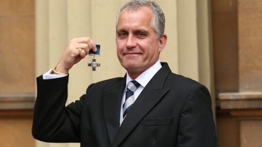Pictures: PA // Dominic Troulan awarded the George Cross by the Queen