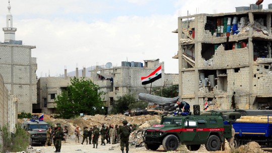 Russian military vehicles enter Douma Damascus Syria April 2018