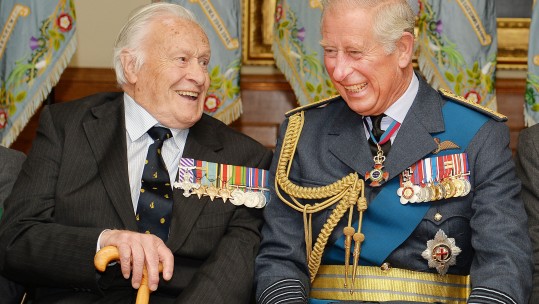 File photo dated 20/09/2015 of Geoffrey Wellum DFC, the youngest surviving Spitfire pilot to fight in the Battle of Britain, enjoying a joke with the Prince of Wales during a reception at Church House following a service at Westminster Abbey, London to mark the 75th anniversary of the Battle of Britain. The former Squadron Leader has died aged 96. Photo credit should read: John Stillwell/PA Archive.
