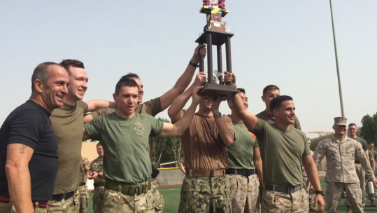 Winning team lifting the trophy