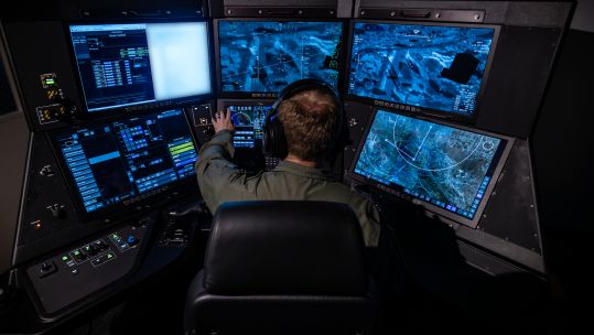 Personnel from 54 Squadron first Instructor Operating Course on Protector simulators at the General Atomics 250823 CREDIT MOD