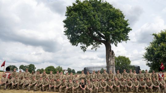 Personnel from Inkerman Company Grenadier Guards pose by the Royal Oak at the end of their 150 mile mission (Picture: British Army).