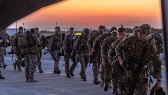 Troops board an aircraft heading to Sudan to evacuate British nationals