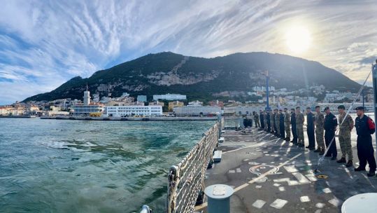 Personnel on board HMS Trent as the ship departs Gibraltar for west Africa deployment