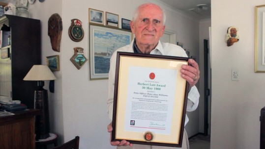 Petty Officer Peter Williams with the award (Picture: Royal Navy).