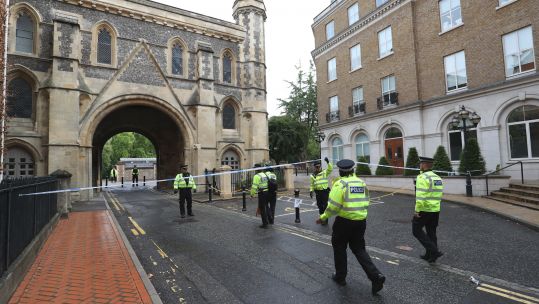 Police at the Abbey gateway of Forbury Gardens in Reading town centre following a multiple stabbing attack in the gardens 210620 CREDIT PA.jpg