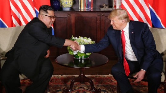 President Trump with Kim Jong-Un in their previous summit (Picture: PA).