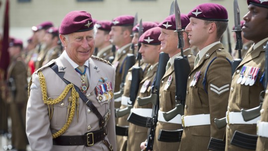 Prince Charles wearing a Sam Browne and lanyard while visiting The Parachute Regiment