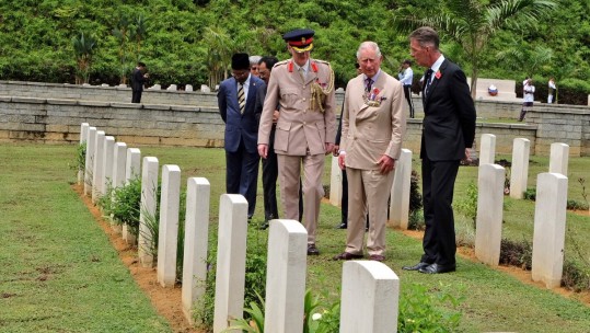 Britain's war dead buried in a foreign field were honoured by the Prince of Wales as he remembered a Second World War pilot awarded the Victoria Cross.