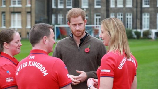 Prince Harry talks with Team UK members at launch