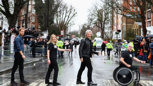 Prince Harry, Jon Bon Jovi and two members of the Invictus Games Choir recreate Abbey Road album cover