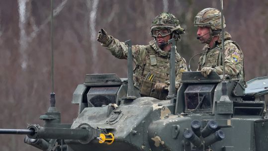 The Prince of Wales crews a Warrior infantry fighting vehicle