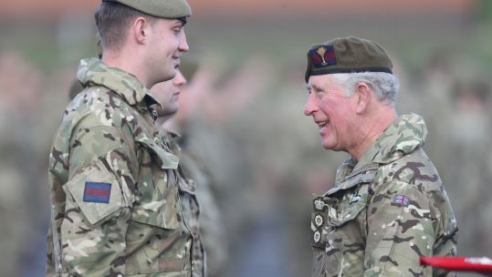 Prince of Wales presents soldiers from 1st Battalion Welsh Guards with Op Toral Medals (Picture: PA).
