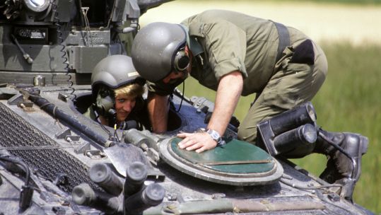 Princess Diana in driving seat of Striker vehicle