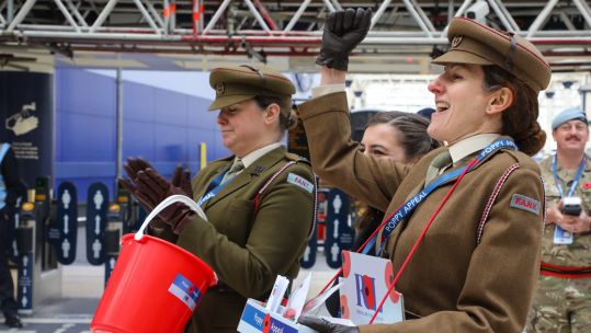 Princess Royal's Volunteer Corps cheer Royal Marines Display whilst selling poppies 04112021 Credit MOD.jpg