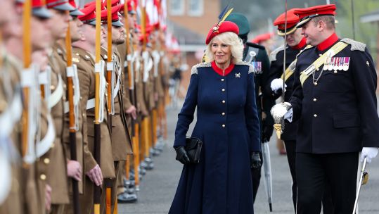 Queen Camilla inspects some of the 152 Lancers on parade during her to visit to the Royal Lancers