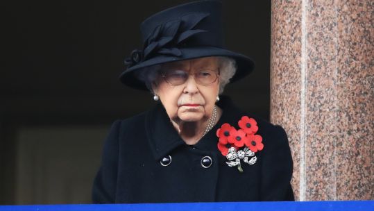 Cover image: The Queen watched on from a balcony at the Foreign, Commonwealth and Development Office building (Picture: PA).