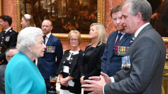 Queen talks to Troulan