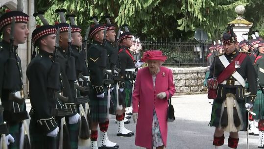 Queen inspecting troops from Balaklava Company, 5th Battalion the Royal Regiment of Scotland, at the gates of Balmoral Castle in August 2021.