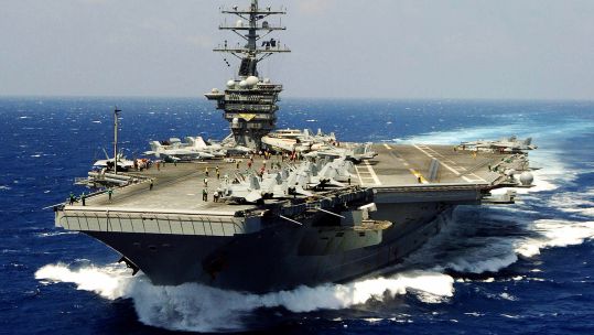 The Nimitz-class aircraft carrier USS Dwight D. Eisenhower transiing the Atlantic Ocean