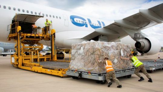 RAF Logistics Team loading aid bound for Nepal at RAF Brize Norton