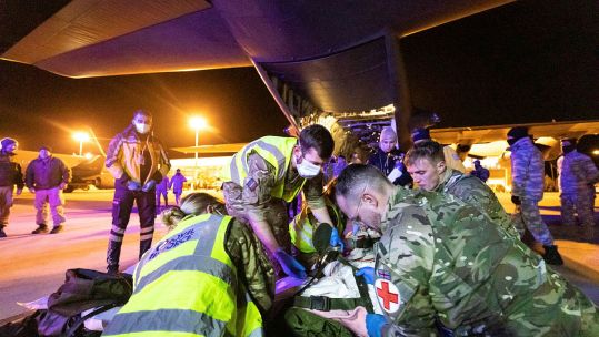 Military personnel - seen here providing treatment to earthquake victims in Turkey - are eligible for the new Humanitarian Medal (Picture: Crown Copyright).
