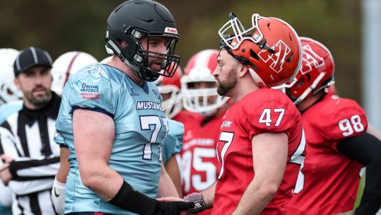 RAF Mustangs and British Army Jackals opponents shake hands after the Mustangs win IS American Football 2025 (Picture: Alligin Photography)