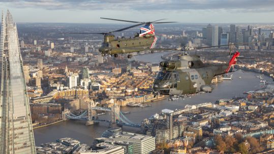 RAF Puma and Chinook helicopters flying over London to celebrate 90 years of combined service 