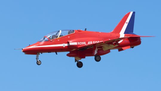 RAF Red Arrows Hawk T1 aircraft on approach for landing at RAF Fairford, UK