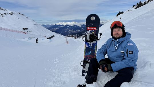 RAF Snowboard instructor AS1 Tech Cain Elliott sits in the Meribel Snowboard Park at ISSSC 75