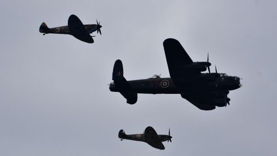 RAF Spitfire and Lancaster aircraft arriving at IWM Duxford as part of a memorial airshow marking the Battle of Britain 170923 CREDIT Battle of Britain Memorial Flight