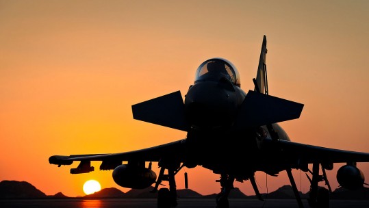 RAF Typhoon in desert sunset