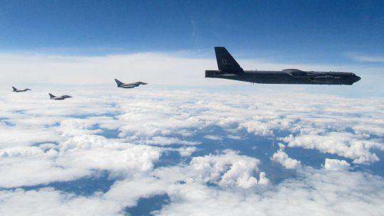 RAF Typhoons simulating an interception of a US B-52 during an exercise whilst deployed on NATO's Air Policing Mission in the Baltics