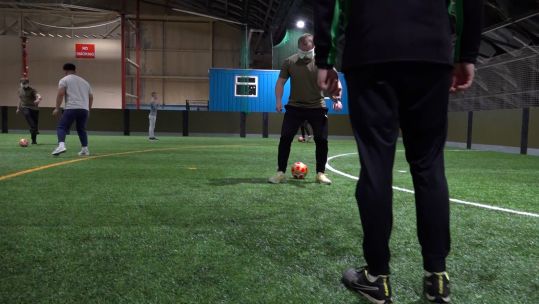 RAF personnel taking part in a coaching session from FA disability coaches